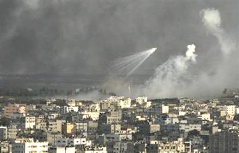 A weapons system fired by Israeli forces explodes over Gaza ...
